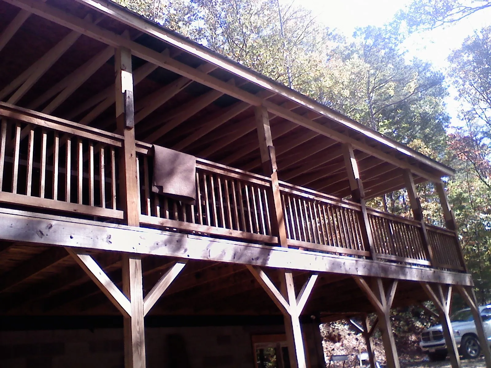 Timber framing under a new elevated porch and deck — Roof Leak Repair in Copenhagen by Roofing Brothers